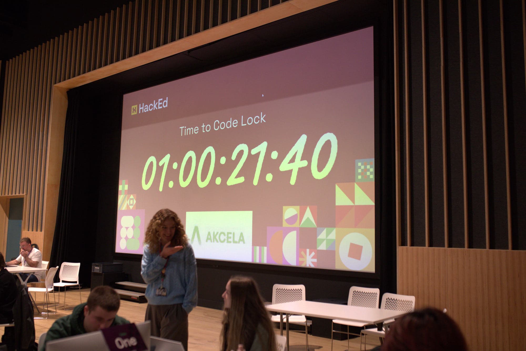 The countdown to code lock on the main auditorium screen at HackEd Norwich 2026