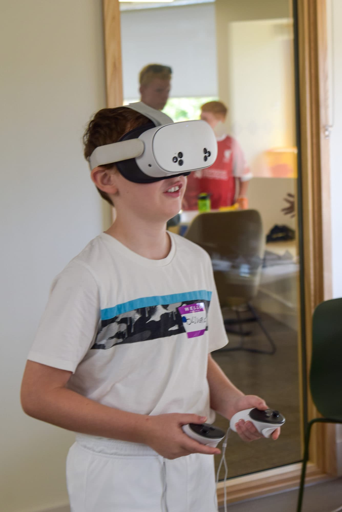 A young participant wearing a VR headset at the Gaming Day
