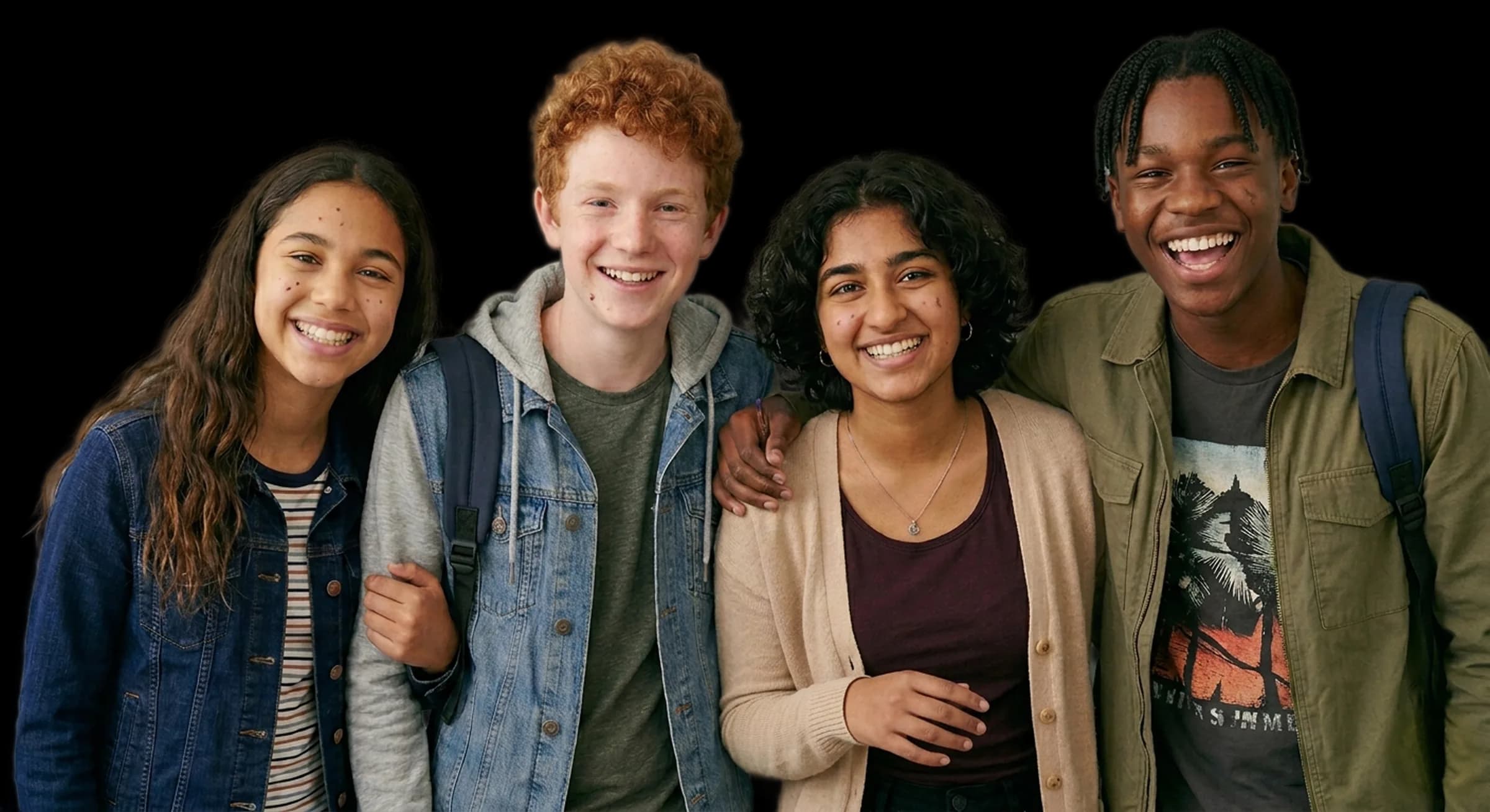 A group of young students smiling together.